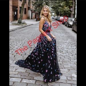 Black floral prom or pageant dress. This is a lovely, elegant black dress! NWT